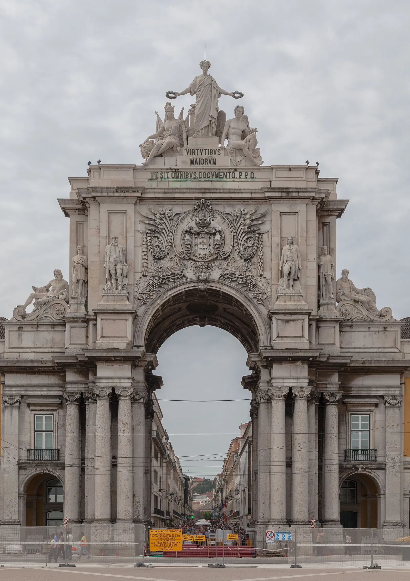 The Rua Augusta arch on Praça do Comércio in Lisbon, Portugal, under a blue sky