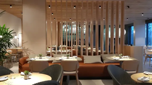 A modern room with a wooden slat partition, an orange sofa and light tables