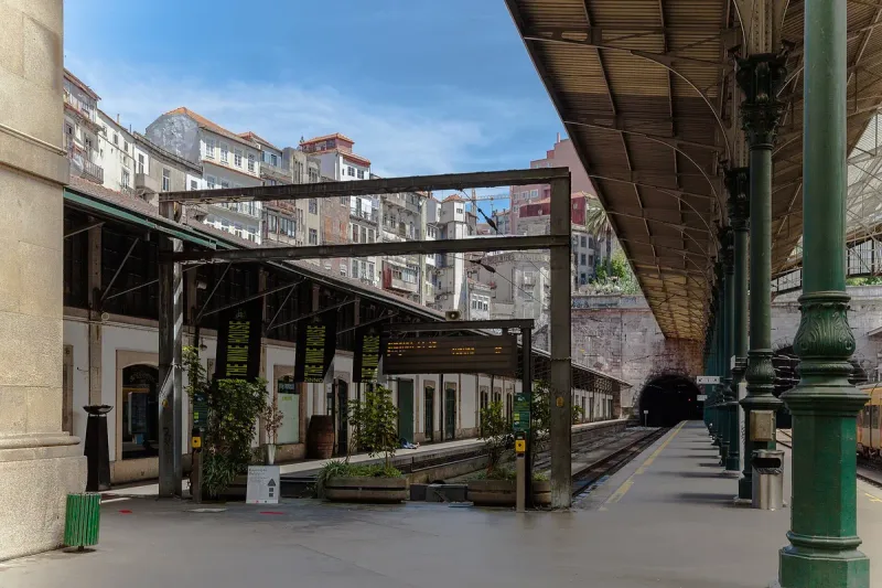 The platforms of Sao Bento station in Porto, under the iron canopy
