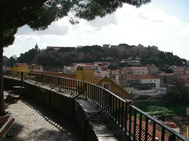 A long viewing terrace facing fortress walls and city rooftops