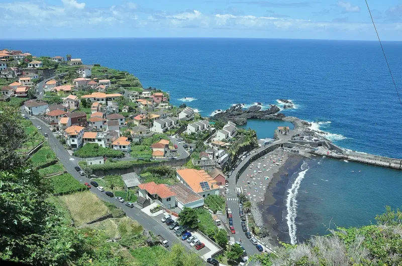 A view from above of Seixal on Madeira and its black rock pools