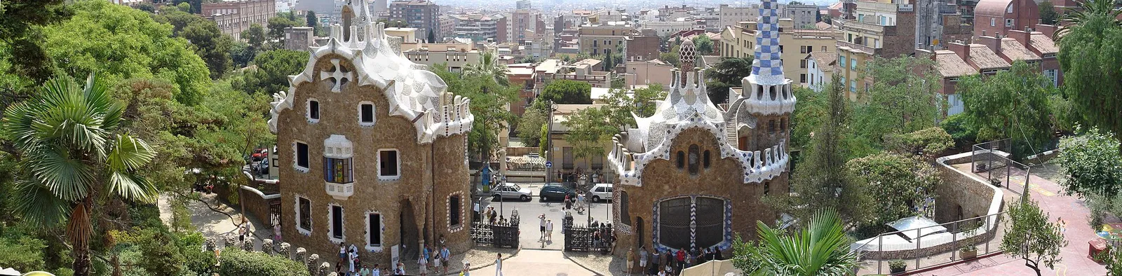 Colorful mosaic terraces of Park Güell overlooking Barcelona, Spain, on a clear day