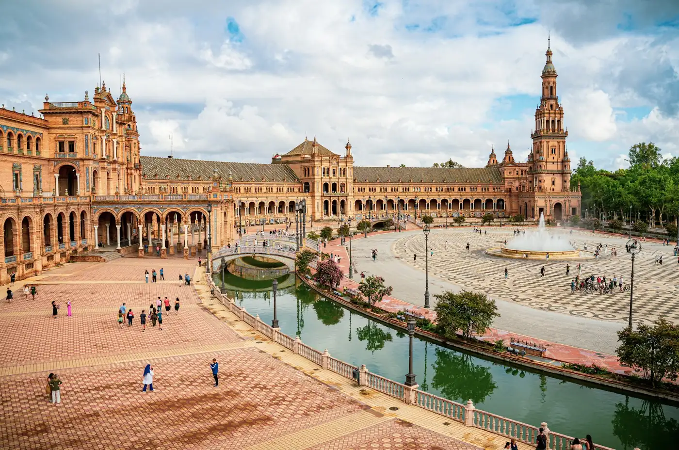 Plaza de Espana in Seville, one of the grand set pieces that pull travellers to Spain