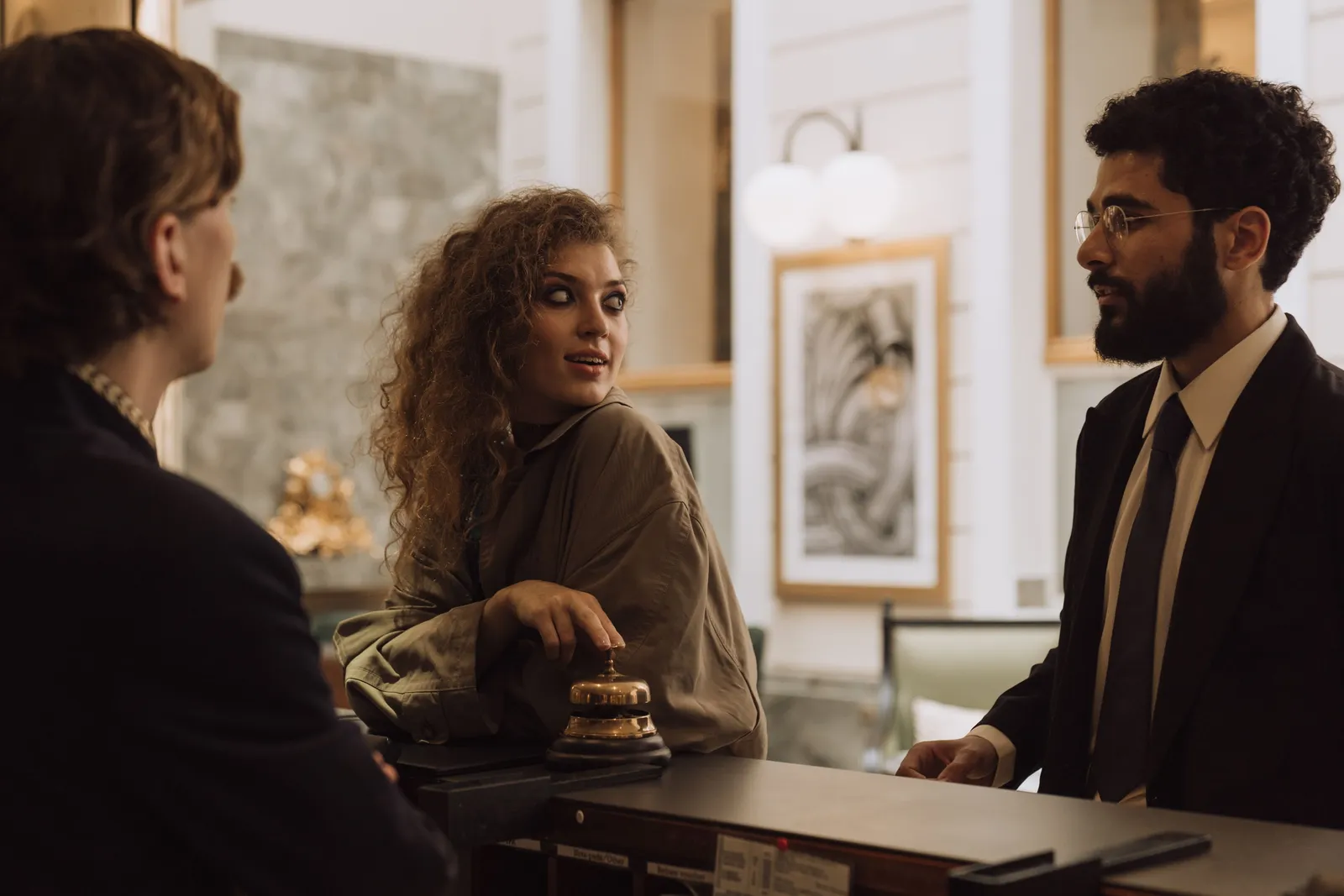 Hotel reception desk with a guest checking in, Portugal